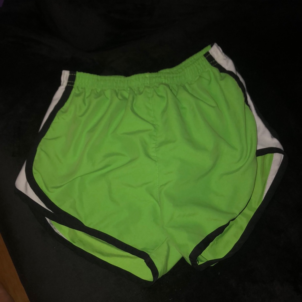 green shorts with black and white
